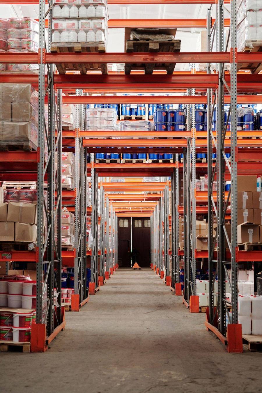 Warehouse racking aisle stocked for e-commerce storage